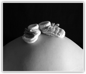 Babybauch mit Schüchen